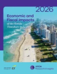 Aerial view of a Florida beach with high-rise buildings, featured on the 2026 Economic and Fiscal Impacts of the Florida Timeshare Industry report cover.